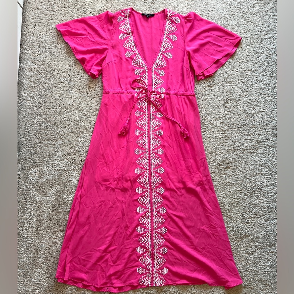 Pink dress with embroidered aztec print
